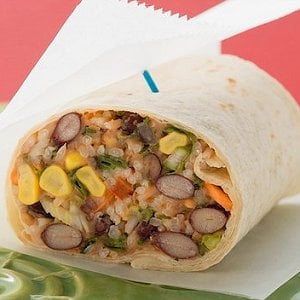 The fast-food version of burritos can be loaded with empty calories and hidden fats. You'll be surprised how quickly you can make a wholesome variety at home using fibre-rich beans and corn, whole wheat tortillas and vitamin-packed fresh peppers. Our recipe is completely vegetarian and easy enough for teenagers to prepare themselves after school. It's also a great healthy snack after a workout or as a fast weeknight meal.