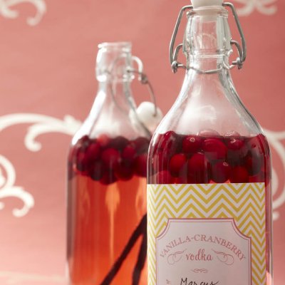 A bottle filled with vanilla-cranberry vodka.
