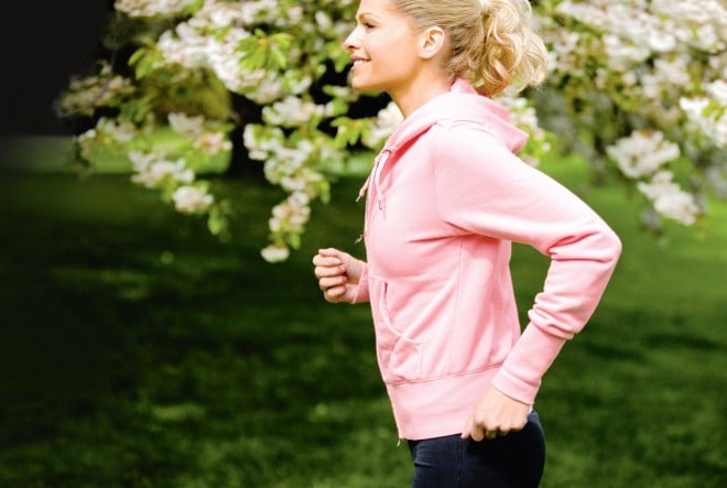 Woman walking or running in the spring