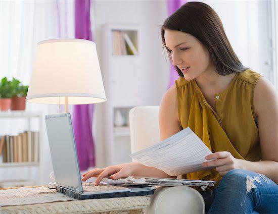 woman on laptop, tax, finance