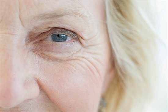 Wrinkled face of an older woman