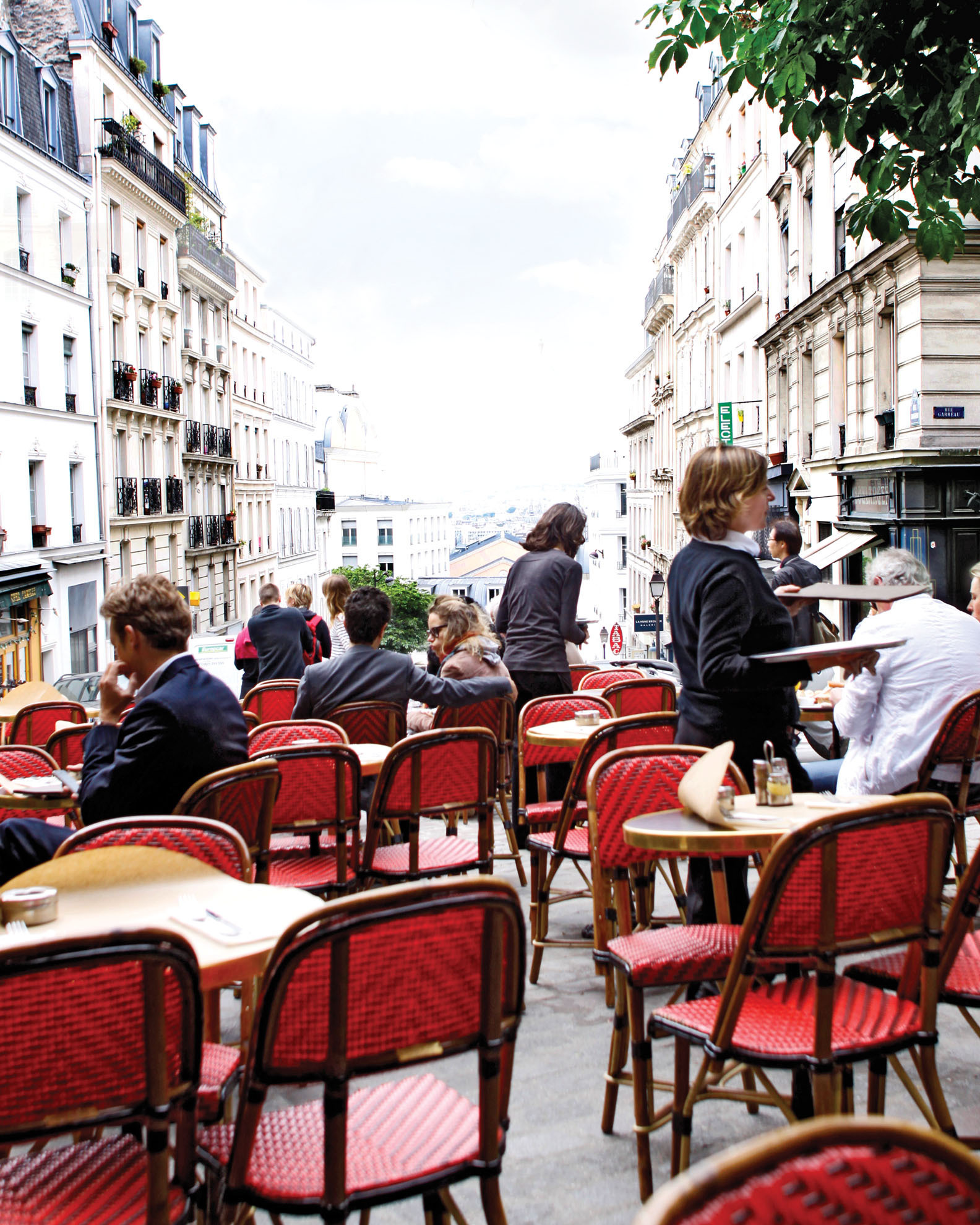 Montmartre outdoor cafe, patio, red chairs