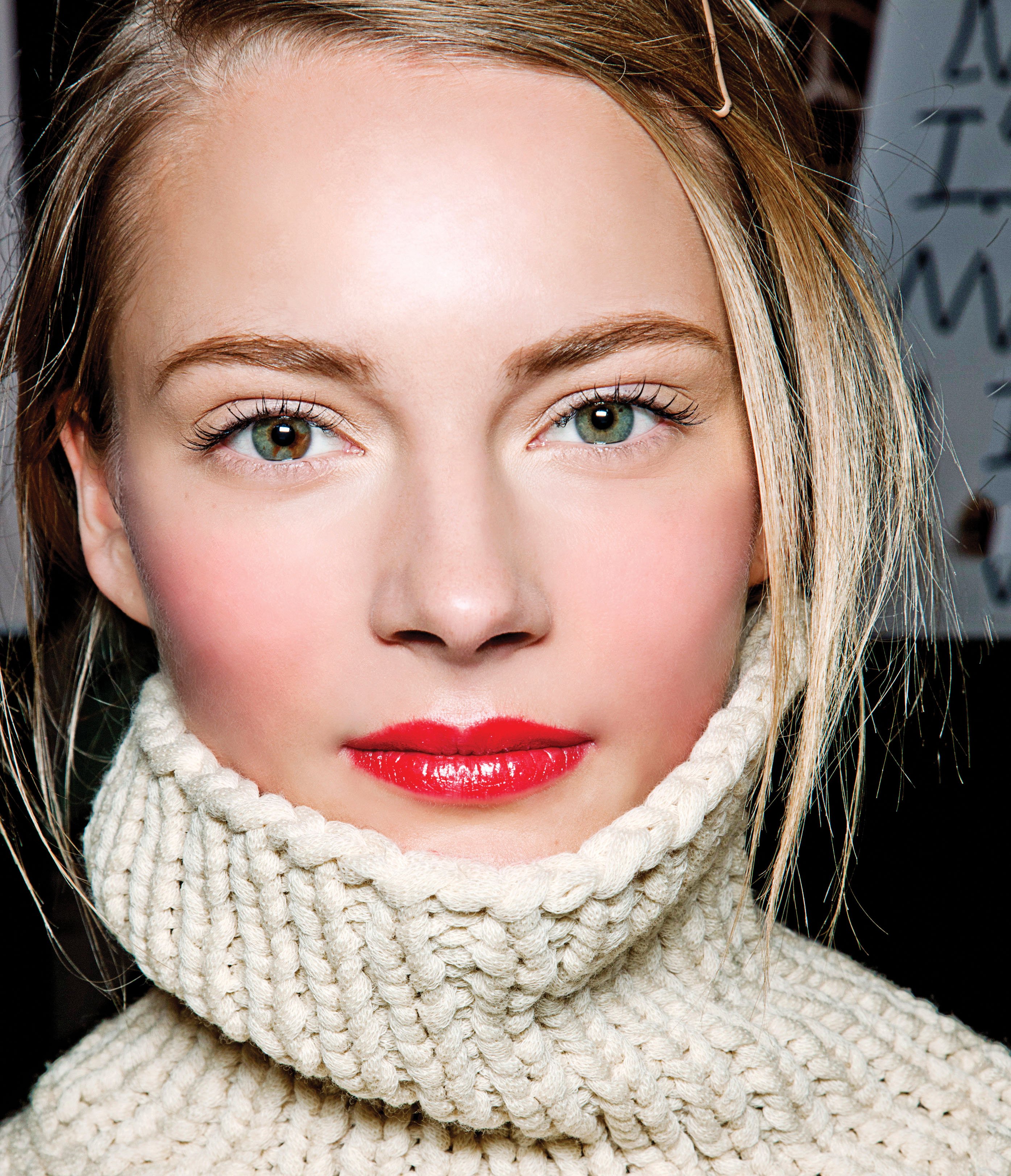 Model red lips, cream turtleneck sweater, Jan 13, p29
