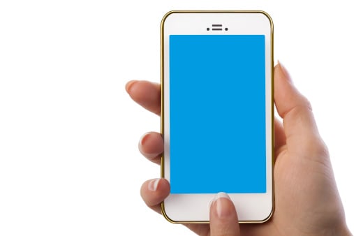 technology woman holding white smart phone with blank blue screen
