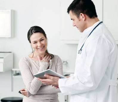 Relieved Woman With Doctor