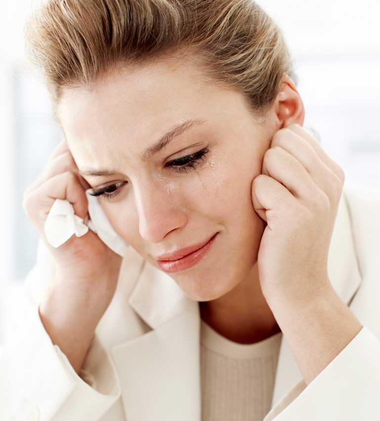 Woman crying at work