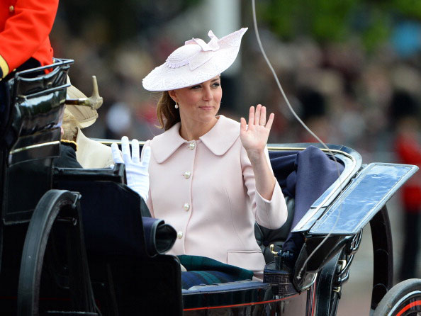 Catherine Duchess of Cambridge, travels by carriage along The Mall to the annual Trooping The Colour ceremony at Horse Guards Parade on June 15, 2013
