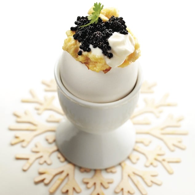 Soft and creamy eggs with caviar