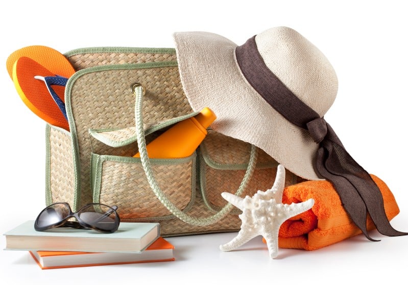 beach bag travel flip flop sun hat book sunglasses trip