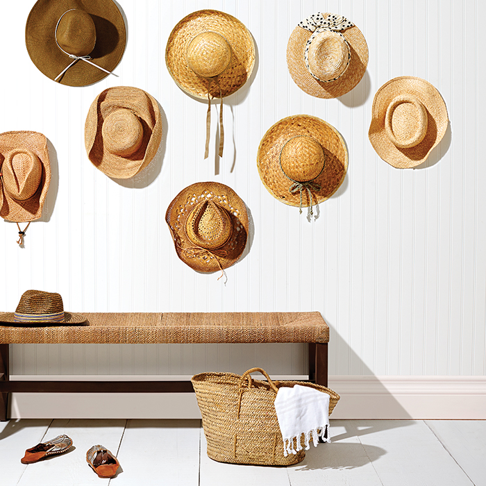 Straw hats beach hats bench storage hallway decor