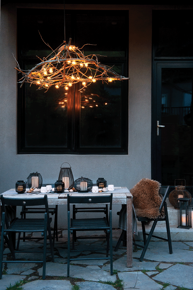 rustic-chandelier-tree-branches-backyard-outdoor-entertaining-evening-night-dining-dinner-party