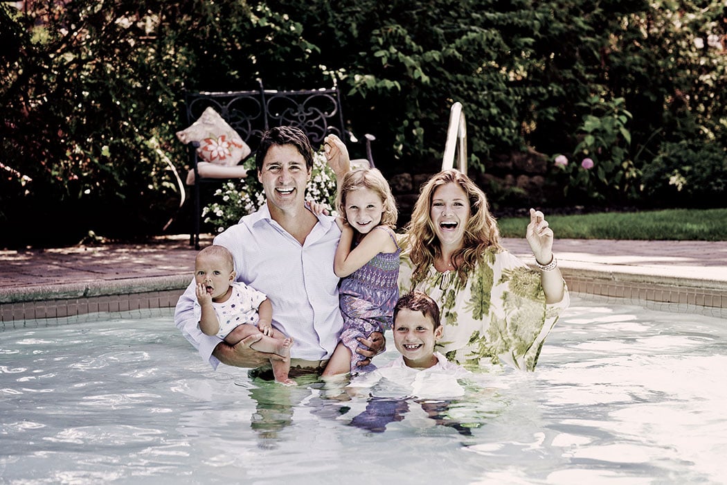 Taking a family dip – fully clothed – in the backyard pool. Photo, Maude Chauvin.