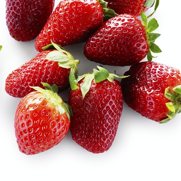 Fresh strawberries on white counter