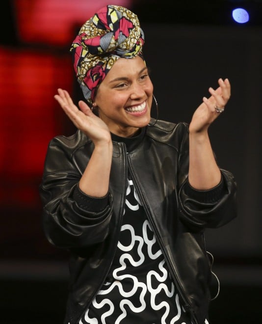 FILE - In this May 23, 2016 file photo, singer Alicia Keys performs at the Italian State RAI TV program "Che Tempo che Fa, in Milan, Italy. Keys and a host of other stars in music and movies, including Beyonce, Rihanna, Taraji P. Henson, Chris Rock and Pharrell, appear in a powerful video released Wednesday, July 13, that describes "23 ways you could be killed if you are black in America." (AP Photo/Luca Bruno, File)
