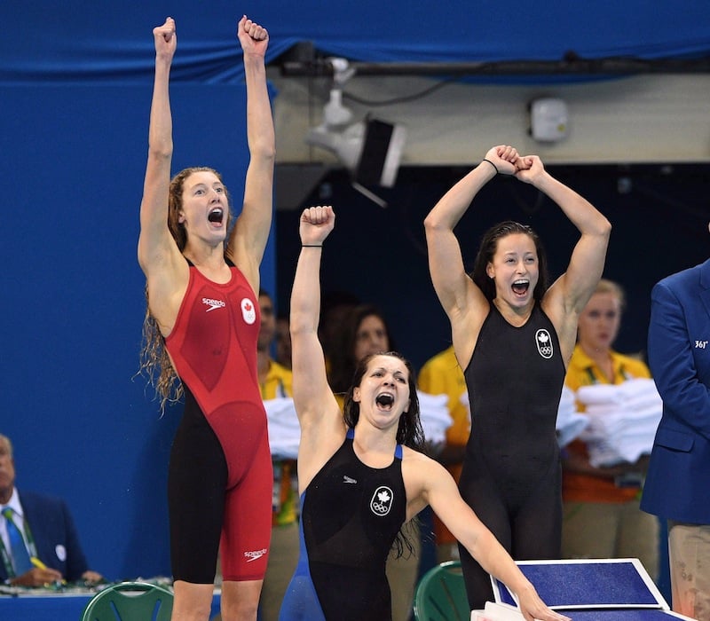Canada's Taylor Ruck, left to right, Brittany MacLean, Katerine Savard and Penny Oleksiak take bronze in the women's 4 x 200m freestyle relay