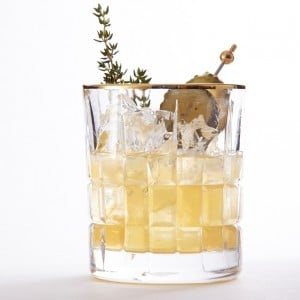 Savoury whiskey cocktail with tarragon and pickle
