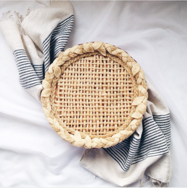decorative pie crusts: braided pastry along border and woven lattice with thin stripes in centre