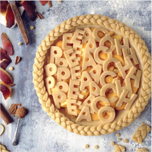 decorative pie crusts: peach pie with letter cut outs and braided edge