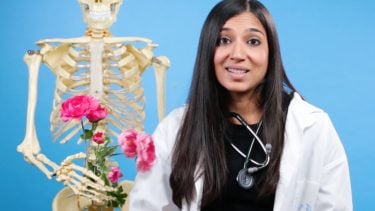 Sr. Seema stands next to a skeleton as she explains why our libido lowers.