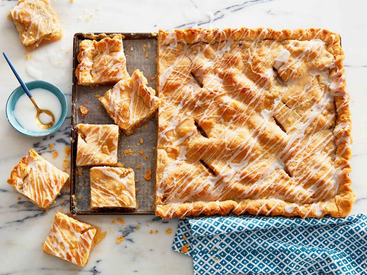 Apple slab pie cut into squares on table