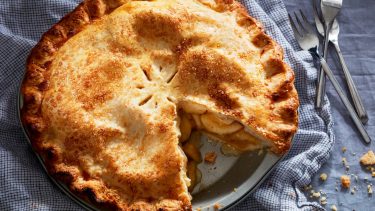 apple recipes: Apple pie with a slice cut out