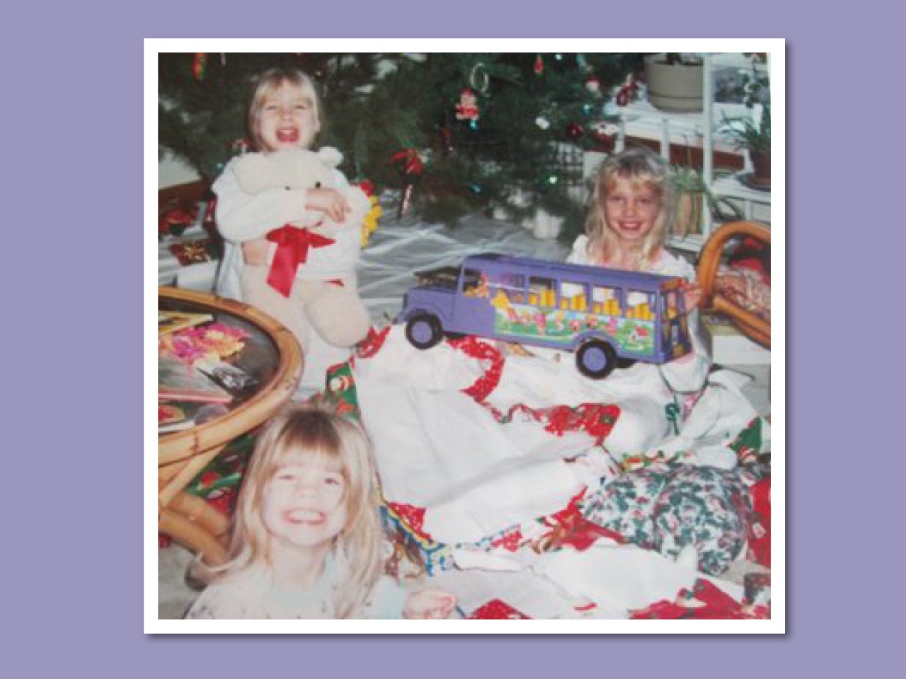 The author, circa 1992, with her sisters, Kate, left, and Lauren (holding the Barbie bus)