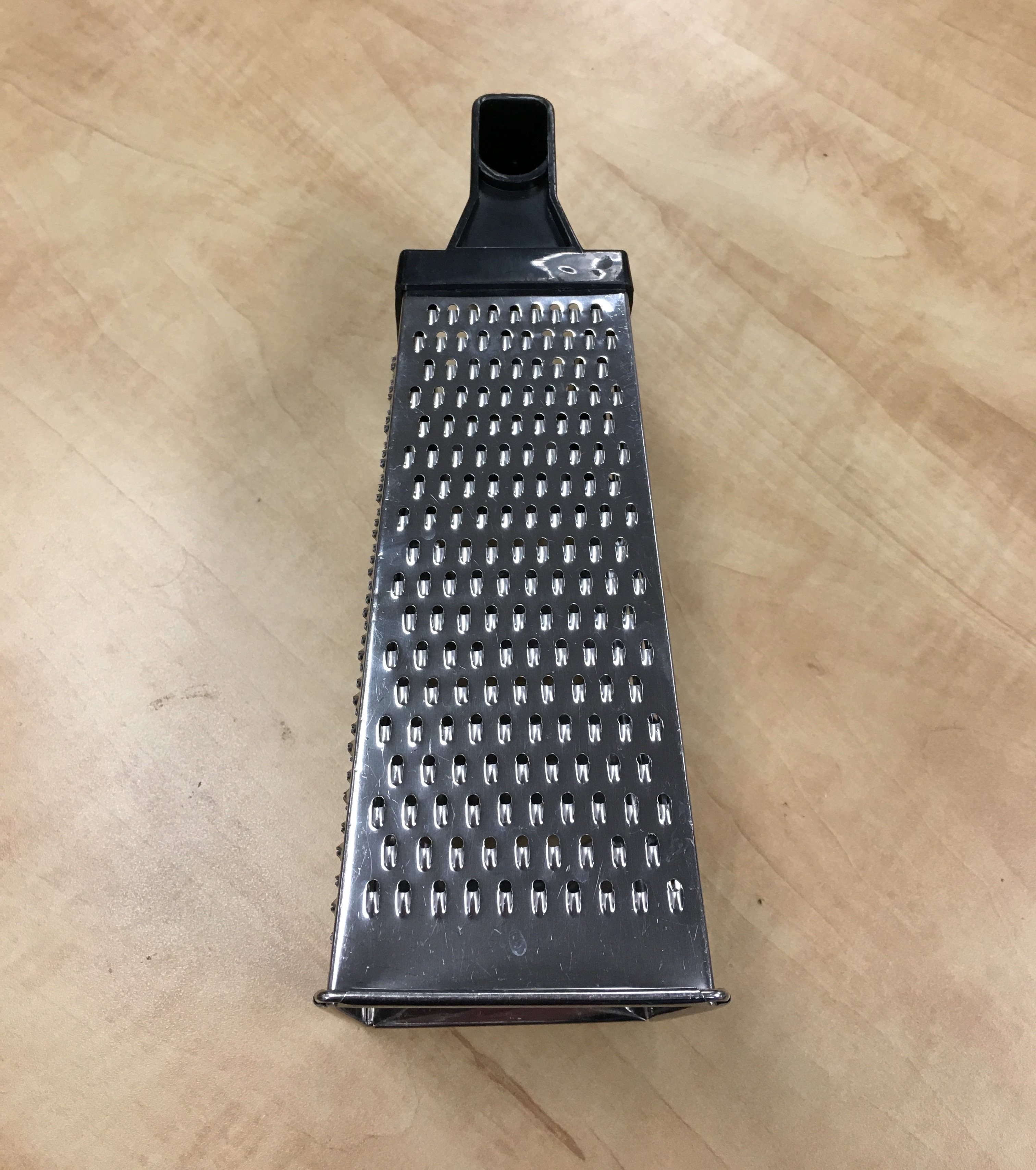 Use this side of a box grater for grating cheddar over a salad.