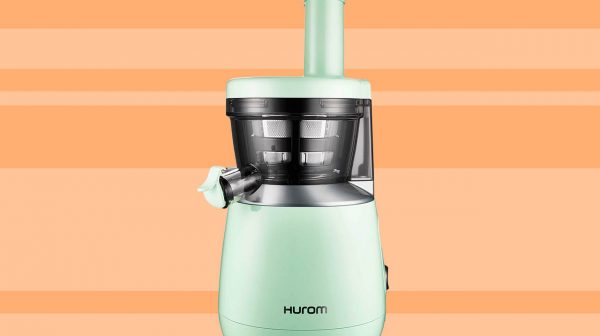 Hurom HP Slow Juicer in mint green.