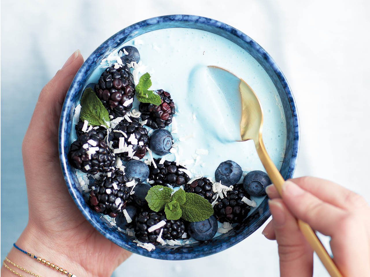 tropical blue majik smoothie bowl with berries