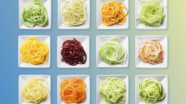 Grocery shopping: Spiralized vegetables on small square white plates