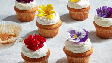 Royal wedding Lemon elderflower cupcakes topped with icing and edible flowers