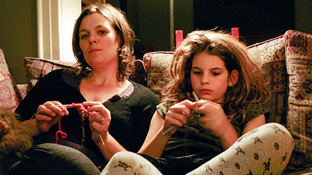 Only child died-writer and her daughter sit knitting side by side
