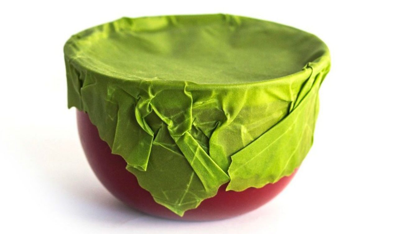 Green Etee reusable food wrap on bowl