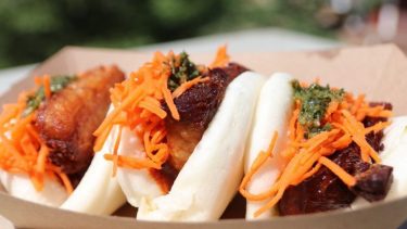 Three bao buns with pulled pork from Calgary food truck.