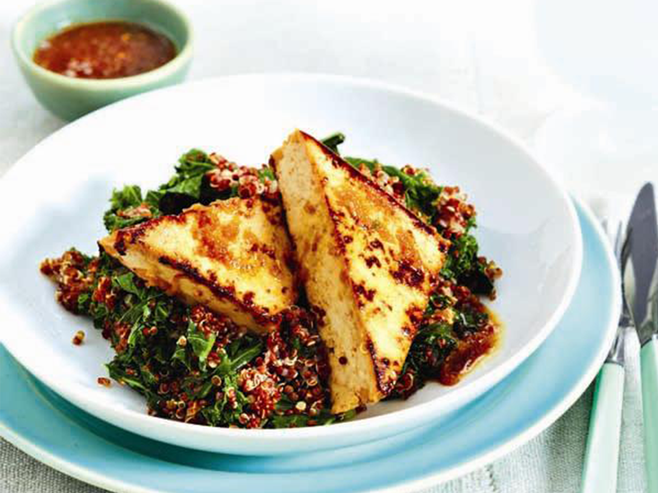 plate of greens and marinated tofu