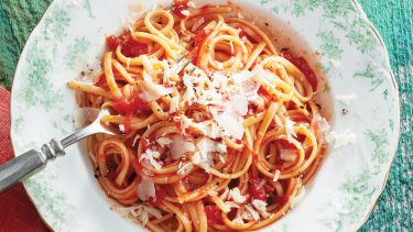 tomato sauce recipe on spaghetti with cheese