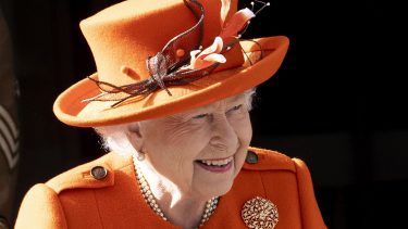 Queen Elizabeths first Instagram post: the Queen in orange hat and coat