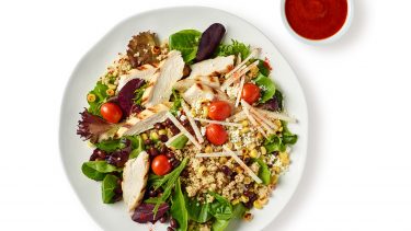 Chicken & Quinoa Protein Bowl with red sauce on side — healthiest food items to order at starbucks