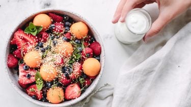 seasonal fruit bowl on a white backdrop