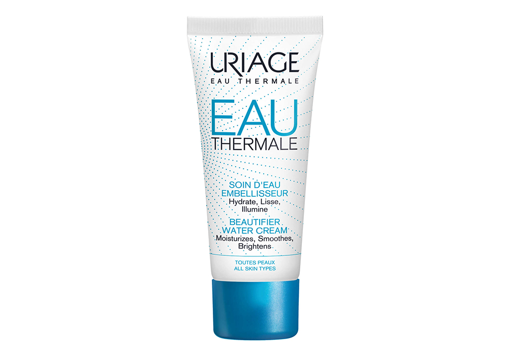 Uriage Eau Thermale Beautifier Water Cream on white background to illustrate a round-up of best drugstore moisturizers for winter.