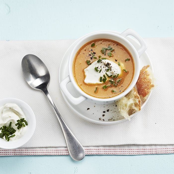 bowl of soup with a dollop of yogurt