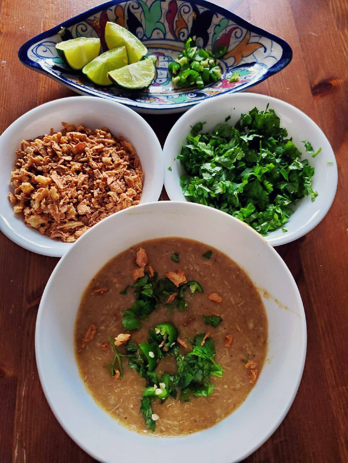 Photo of haleem, a South Asian dish of lentils and meat.