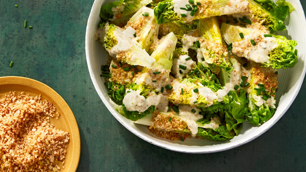 A bowl of vegan plant-based caesar salad for a recipe for how to make it