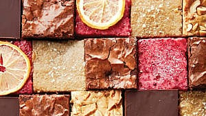 Variety of multi-coloured chocolate, maple, and lemon dessert squares