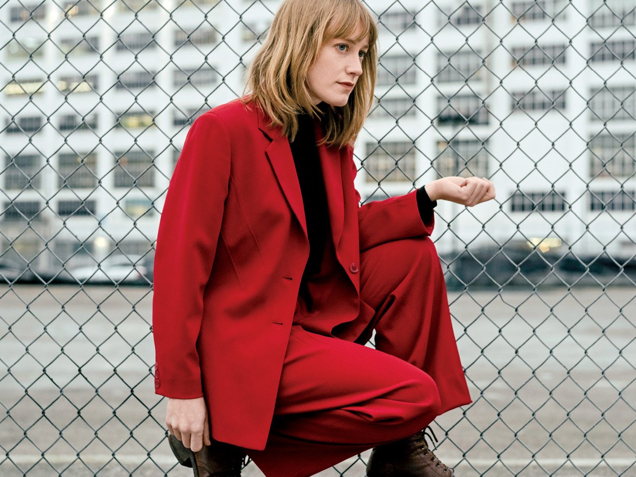 the Weather Station (a.k.a. Toronto’s Tamara Lindeman, in a red suit and black shirt