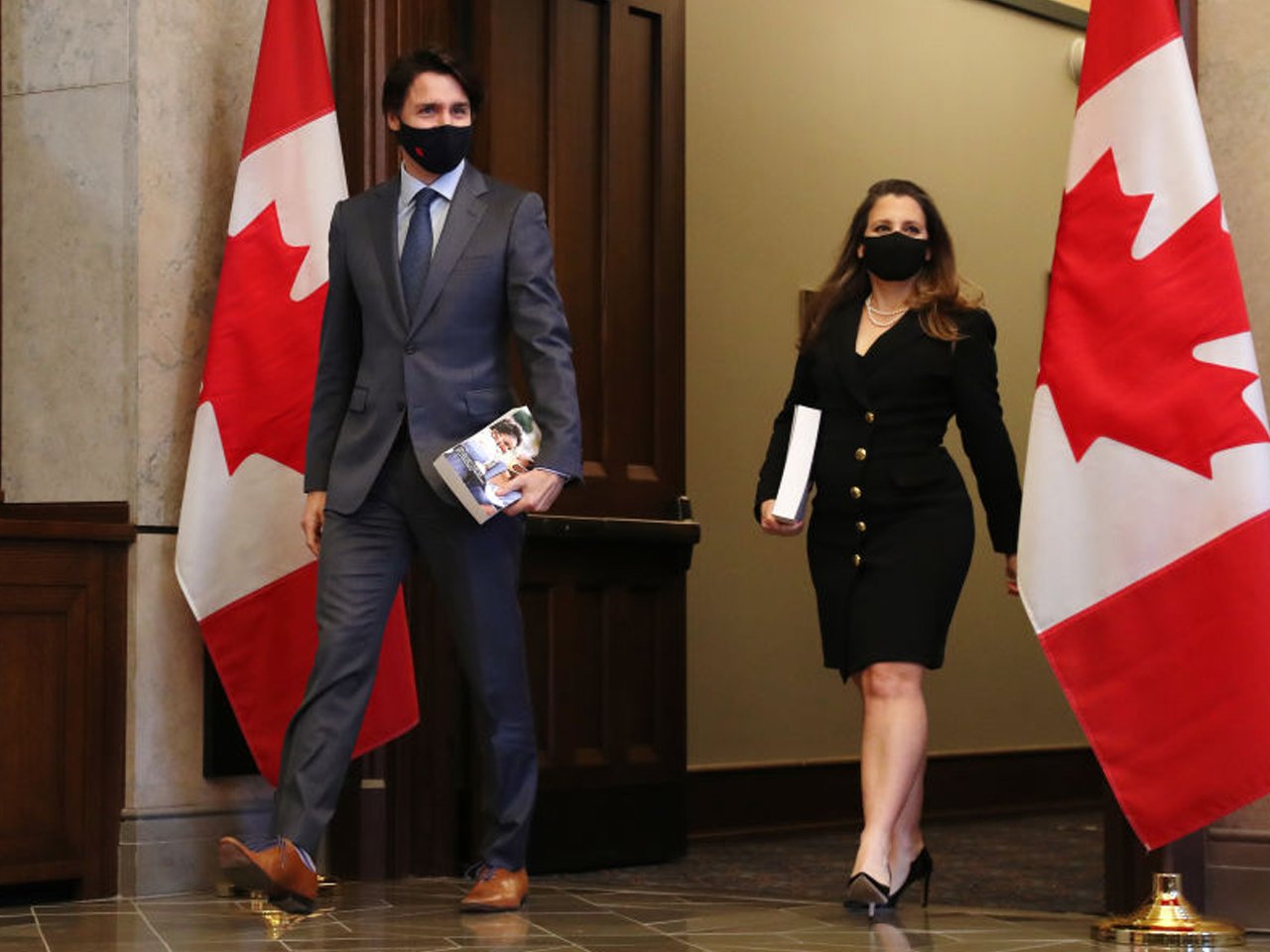 Justin Trudeau and Chystia Freeland arrive for tabling of 2021 budget