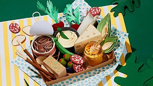 Paper art of a summer picnic snack pack