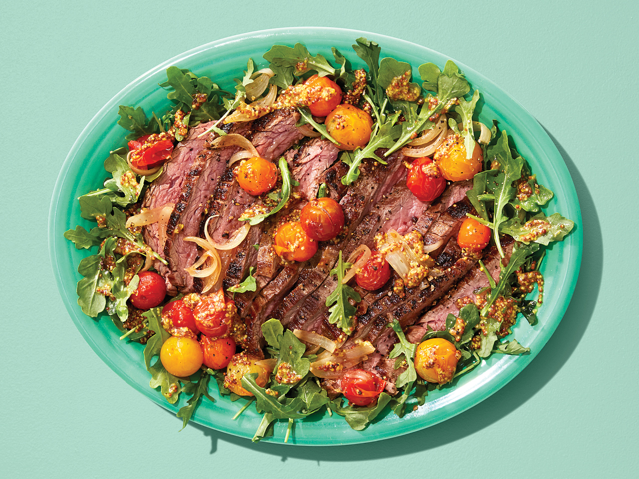 Steak and Arugula Salad with Warm Tomato Dressing