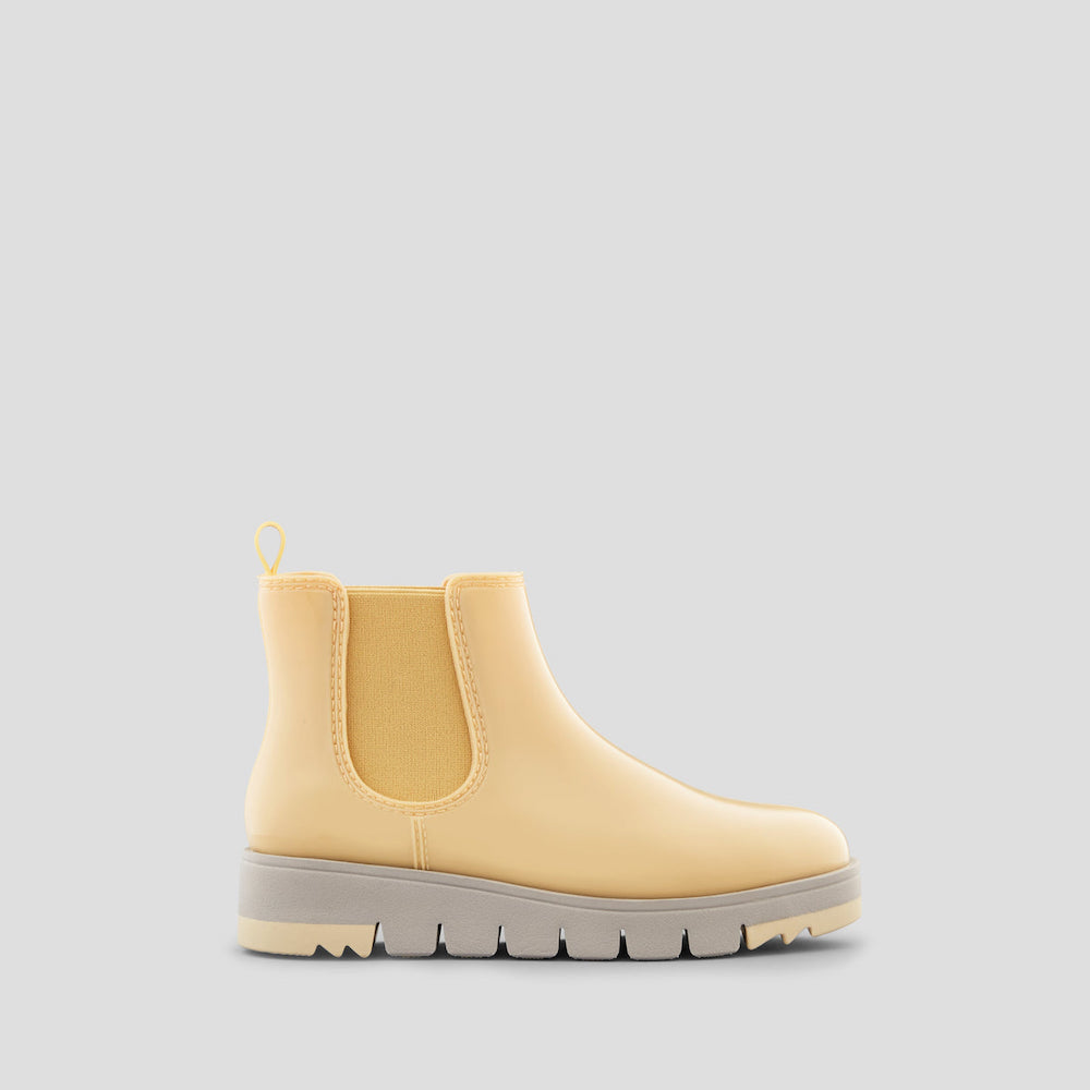 A pastel yellow chelsea rain boot from Cougar Shoes