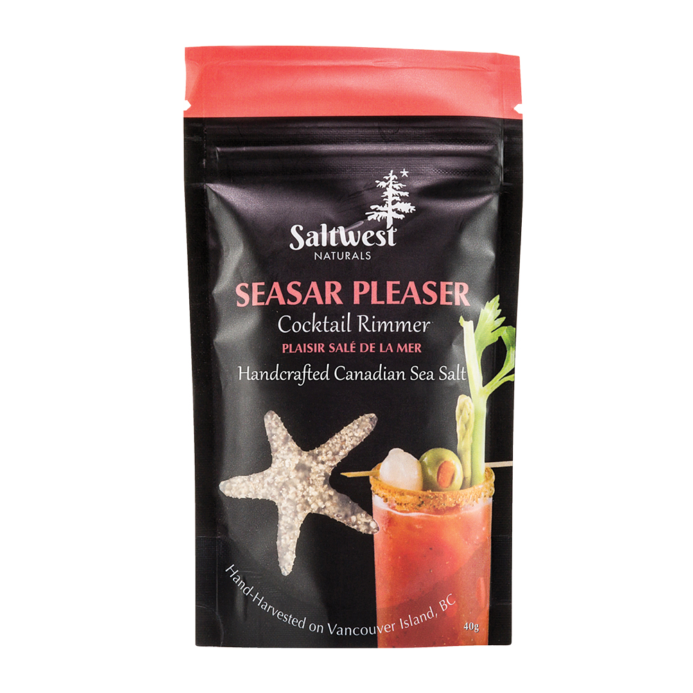 A black and red packet containing sea salt and an image of a starfish and glass of red juice on the packet. 